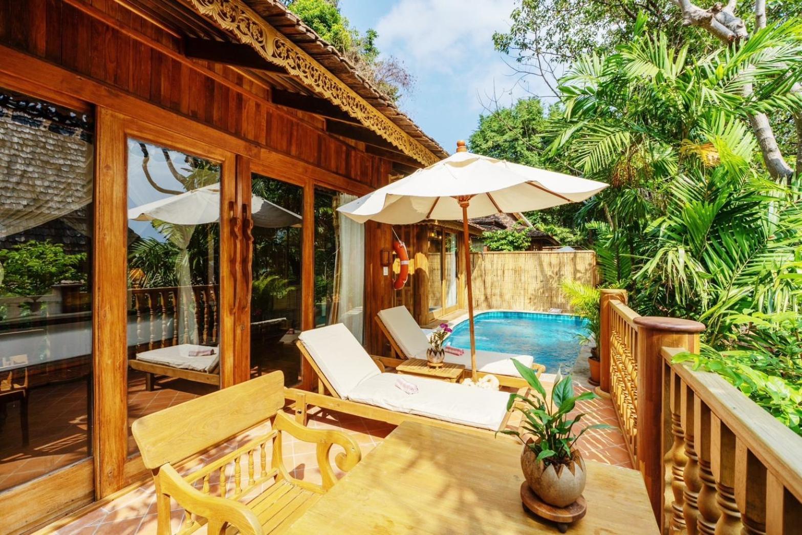 Santhiya Koh Phangan Resort And Spa Luaran gambar A pool villa at the resort